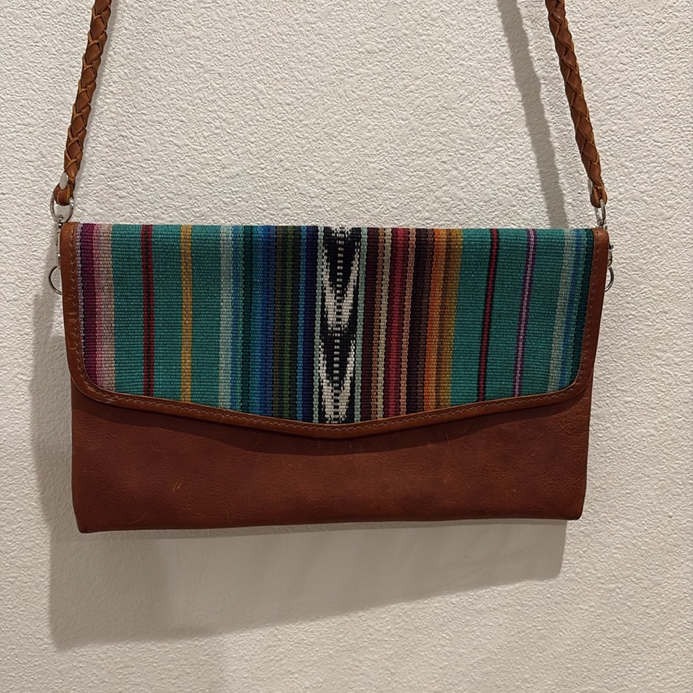 Nena and Co clutch purse with removable braided strap. Genuine leather